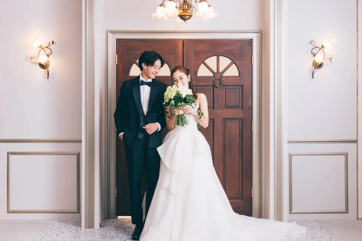 微笑み合う新郎新婦様